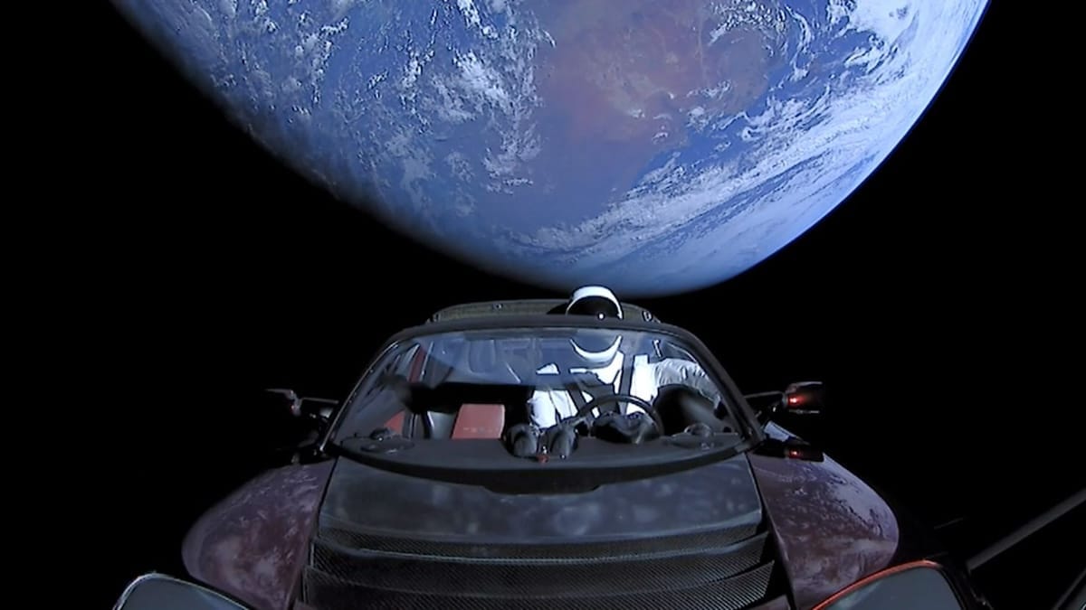 Tesla Roadster with Spaceman in Space