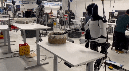 Optimus Robot Folding a Shirt